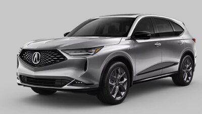 Vue avant 3/4 d’un Acura MDX gris sur fond blanc.
