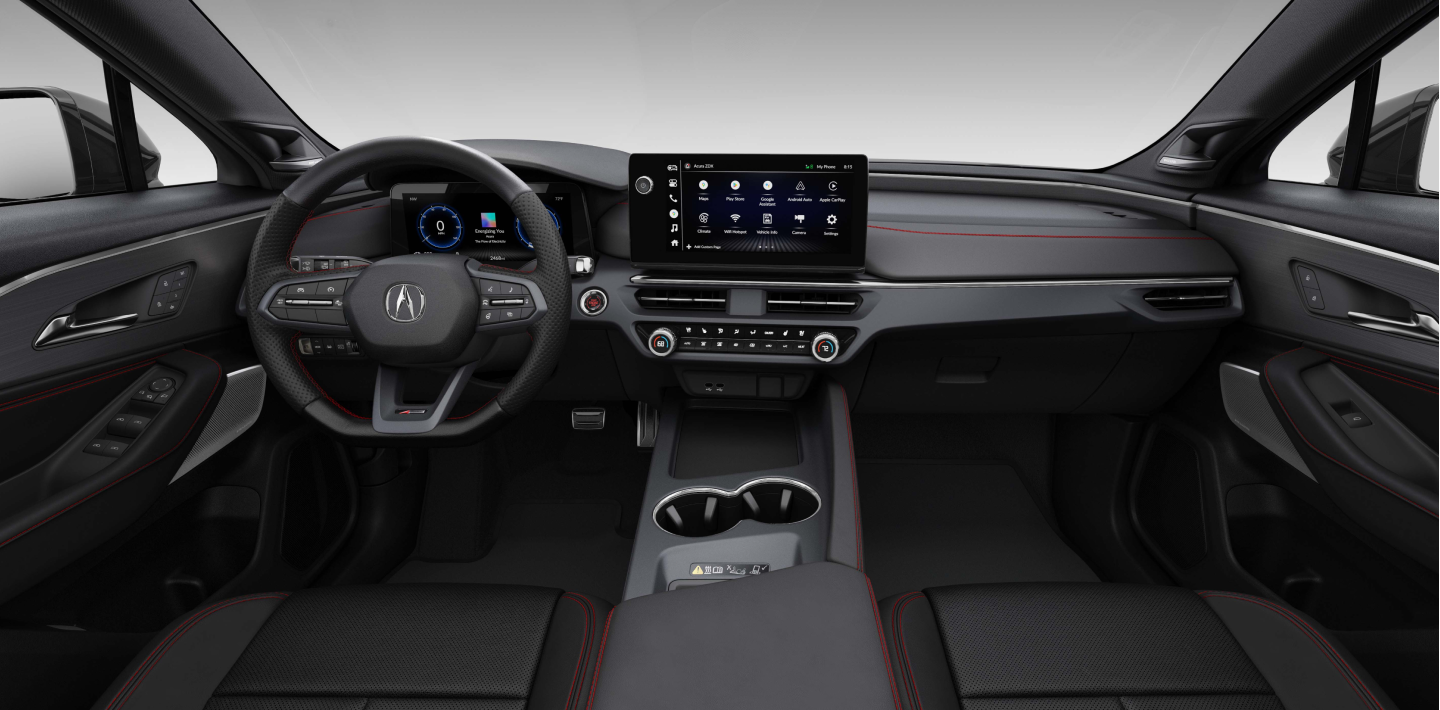 Front panoramic view of steering wheel, centre console, and dashboard.