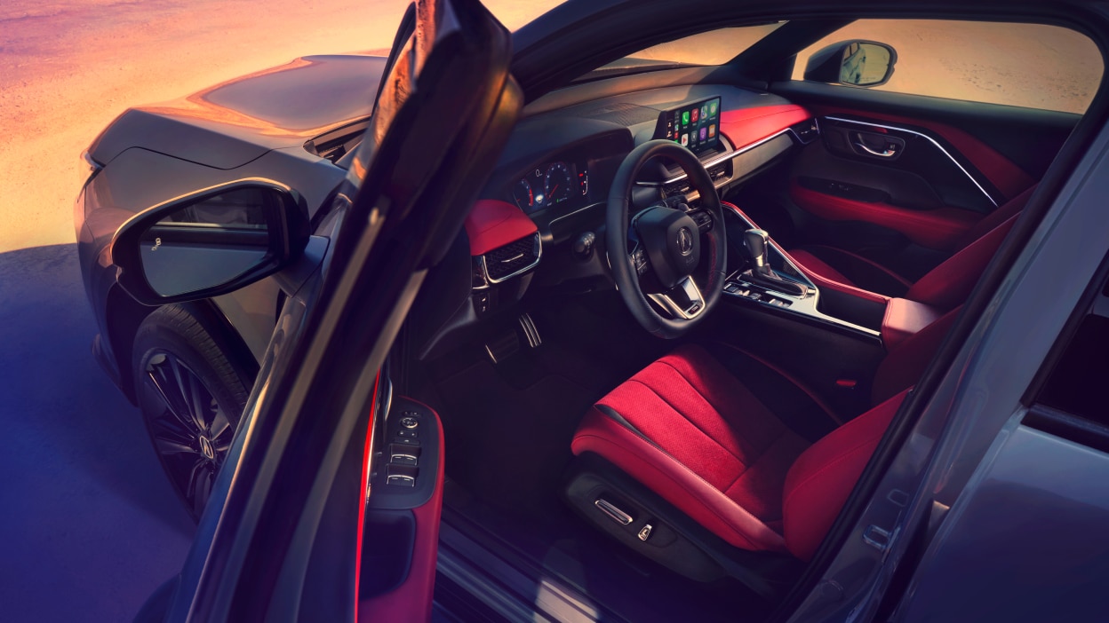 Close up side-view of Acura ADX showing the interior.