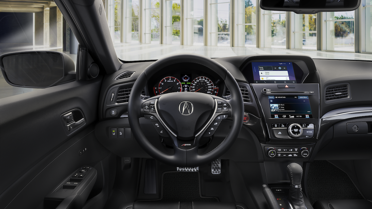 Image of 2021 ILX interior steering wheel & driver features.