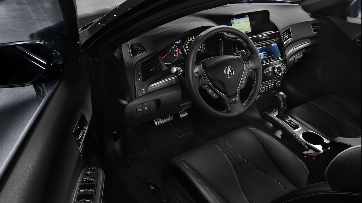 Image of 2022 ILX interior steering wheel & driver features.