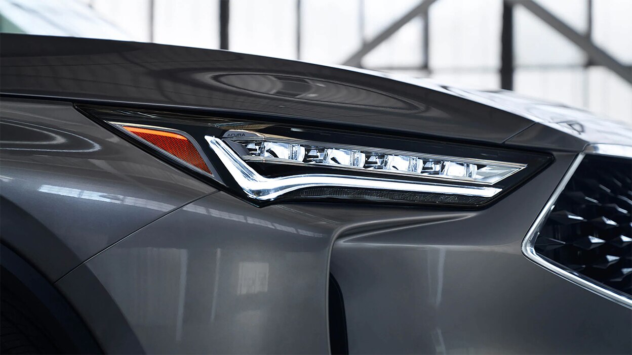 A close-up of a headlight on the MDX.