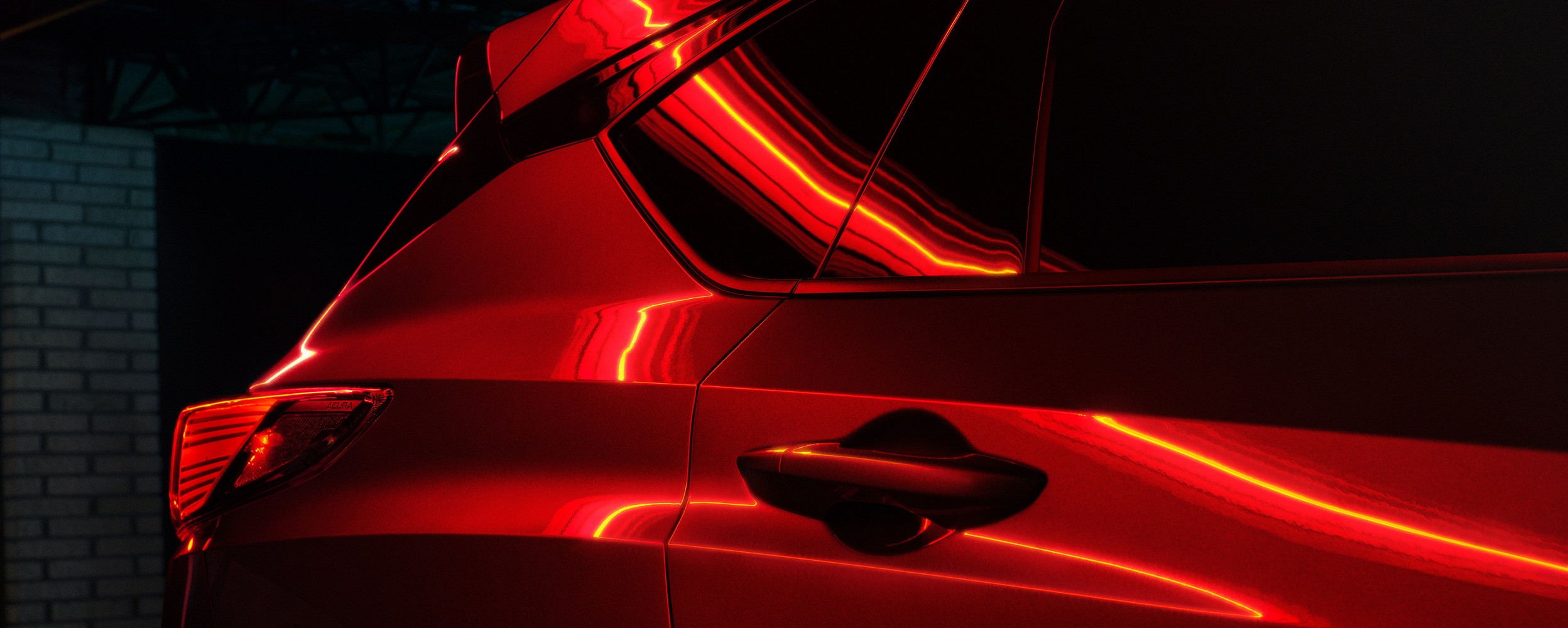 3/4 front view of blue RDX in warehouse, sunlight beaming through windows.