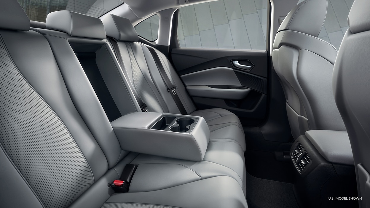 The back seats of a TLX, featuring a grey interior.