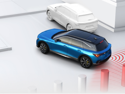 Digital rendering, where everything is white except for the ZDX. 3/4 bird’s eye rear view of blue ZDX backing out of a parking spot. Blue sensor lines emit from the back, detecting a pole.  