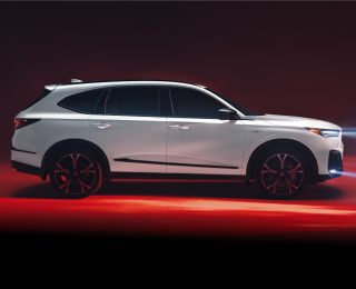 Vue latérale du côté conducteur de la MDX blanc