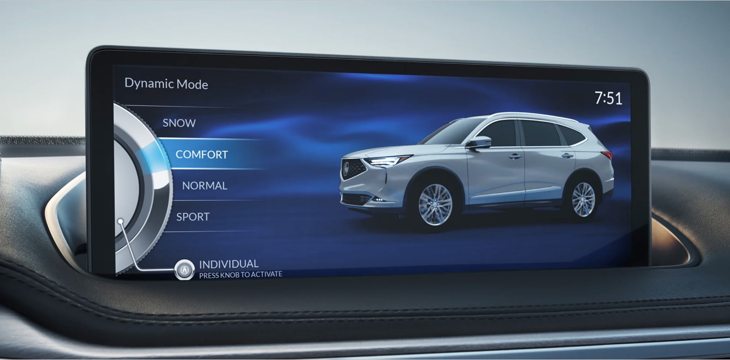 Close-up of the navigation screen in an Acura MDX displaying the different drive modes available to the driver. The mode “COMFORT” is selected and highlighted blue.  	Gros plan de l’écran de navigation d’un Acura MDX affichant les différents modes de conduite offerts au conducteur. Le mode « COMFORT » est sélectionné et mis en évidence en bleu.