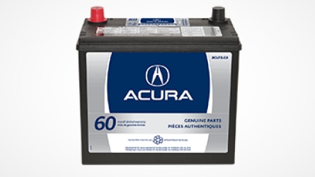 Studio shot of a genuine Acura car battery. // Une photo en studio d'une batterie de voiture Acura d’origine . 	